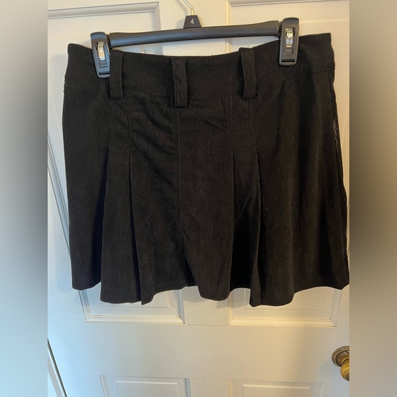 Corduroy black skirt size medium. Worn once with leggings and boots.  Adorable - Picture 2 of 2